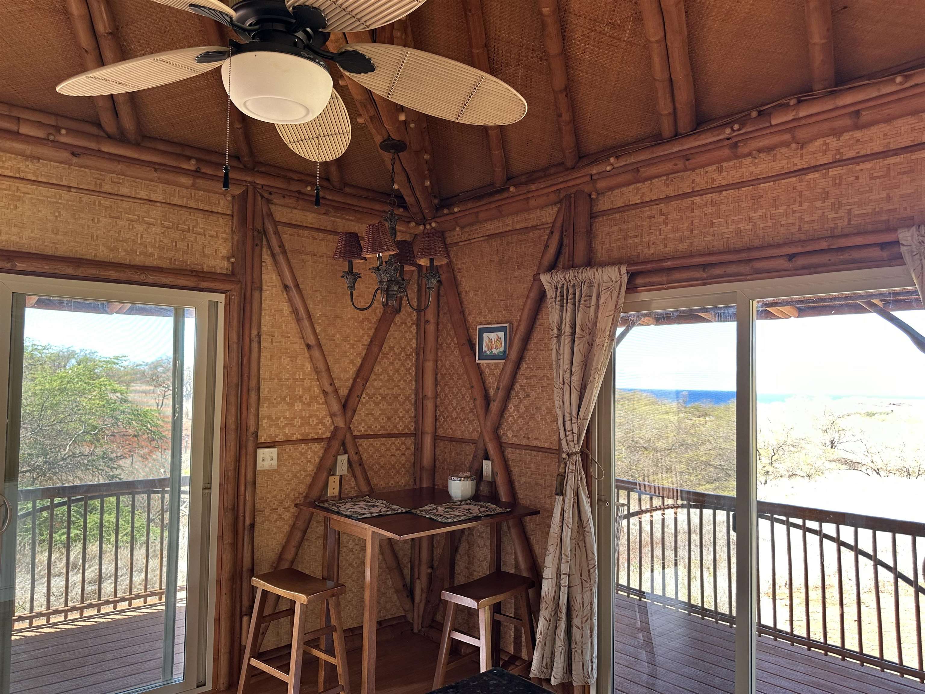 206 Awawa Road Maunaloa, HI 96770 - Photo 21 of 28 a view of a room with wooden floor and furniture