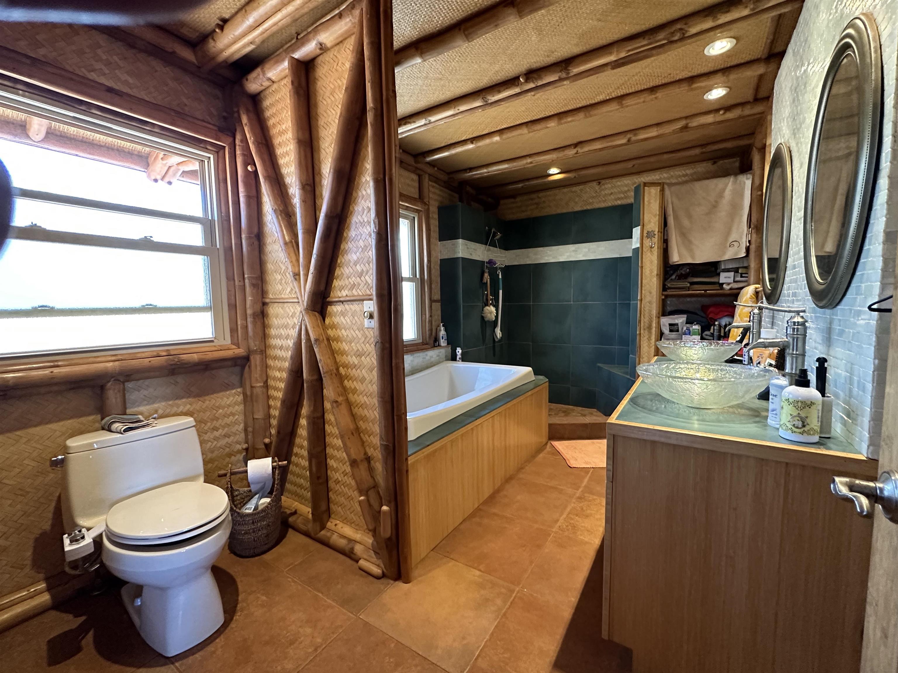 206 Awawa Road Maunaloa, HI 96770 - Photo 6 of 28 a bathroom with a toilet sink and mirror