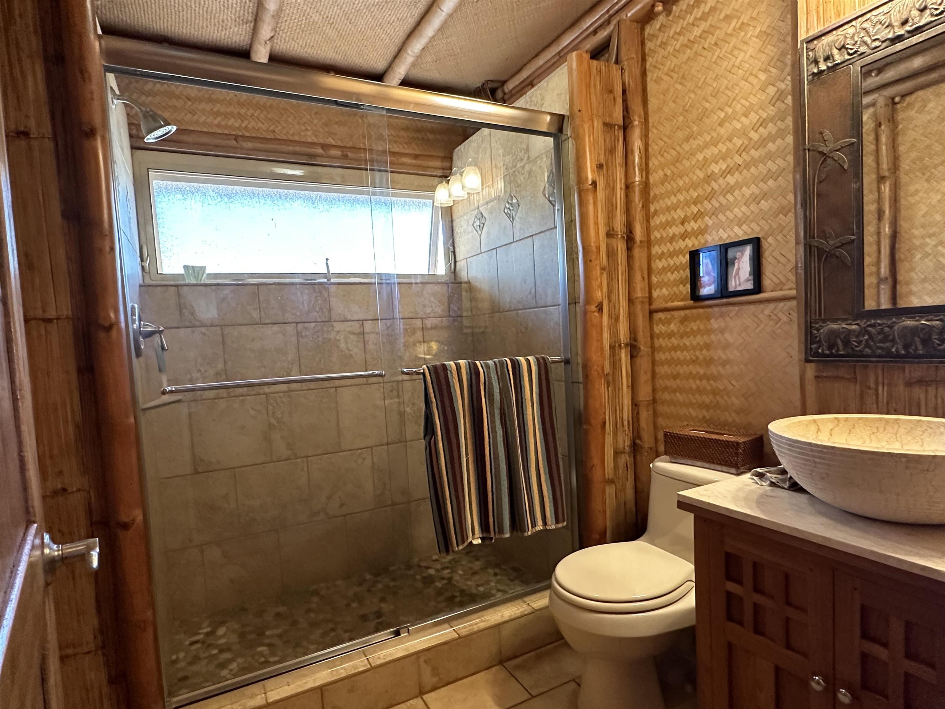 206 Awawa Road Maunaloa, HI 96770 - Photo 10 of 28 a bathroom with a sink and a toilet