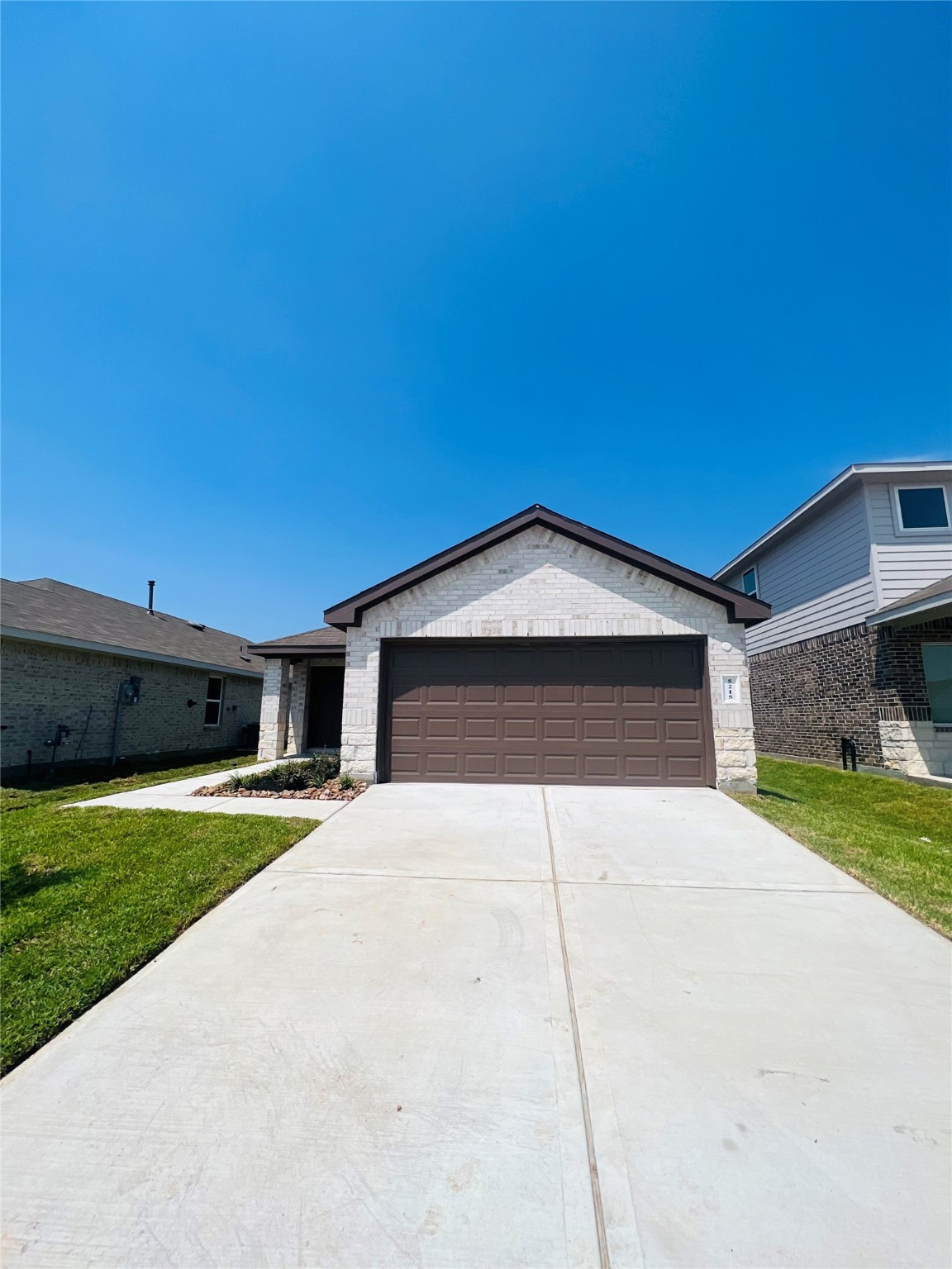 a house with yard in front of it
