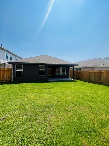 a front view of house with yard and porch