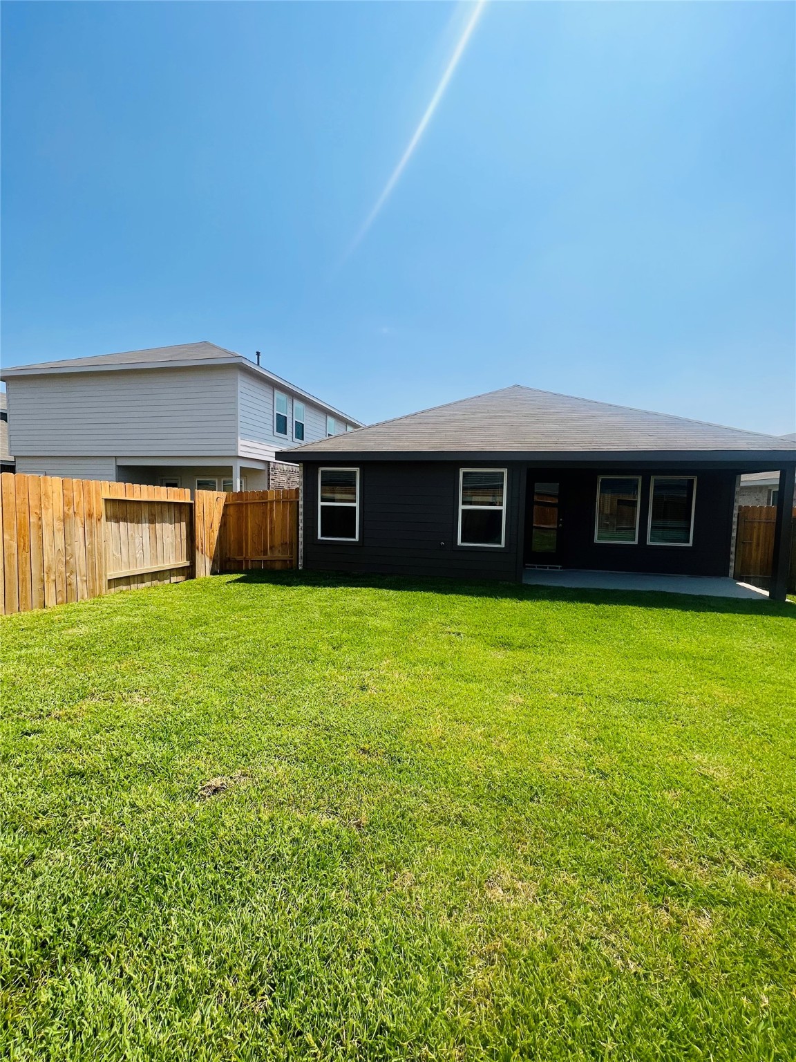 5215 Mossdale Bluff Ln Spring Spring, TX 77373 - Photo 17 of 25 a view of a house with a backyard
