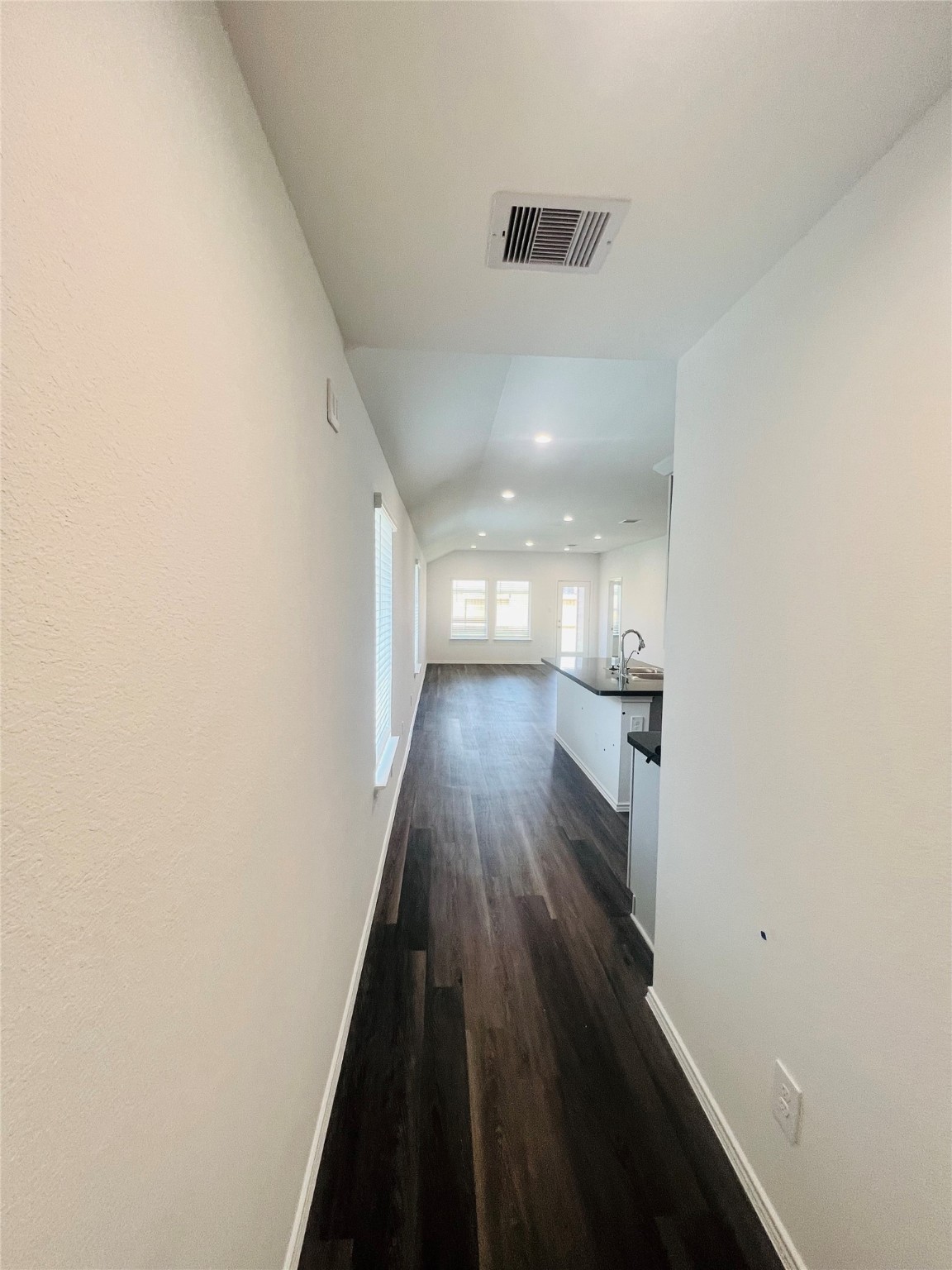 5215 Mossdale Bluff Ln Spring Spring, TX 77373 - Photo 24 of 25 a view of hallway with wooden floor