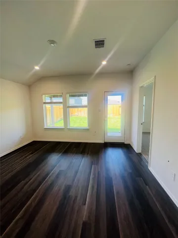 a view of an empty room and window