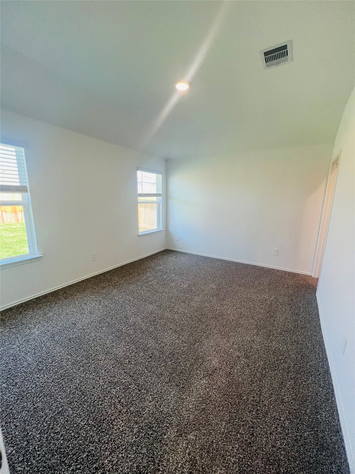 5215 Mossdale Bluff Ln Spring Spring, TX 77373 - Photo 10 of 25 an empty room with a window