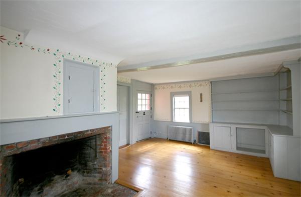 29 River Road Wayland, MA 01778 - Photo 8 of 18 a view of empty room with wooden floor and fan