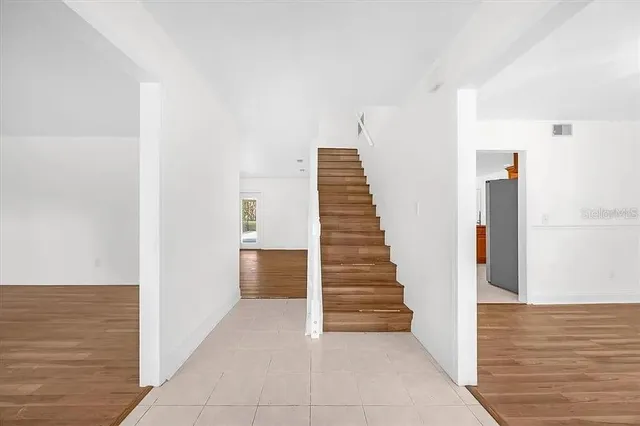 a view of an entryway with staircase