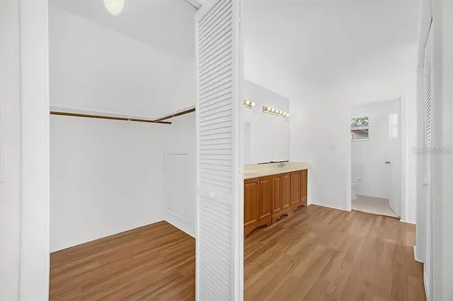a view of a storage & utility room with wooden floor