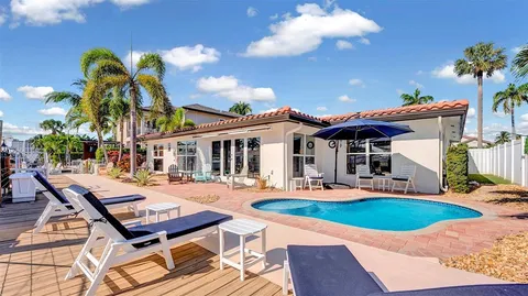 a view of a house with entertaining space