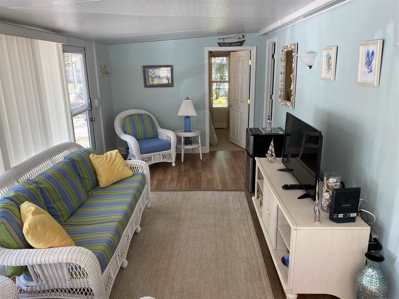 516 Highway 9 Marmora, NJ 08223 - Photo 12 of 28 a living room with furniture and a flat screen tv