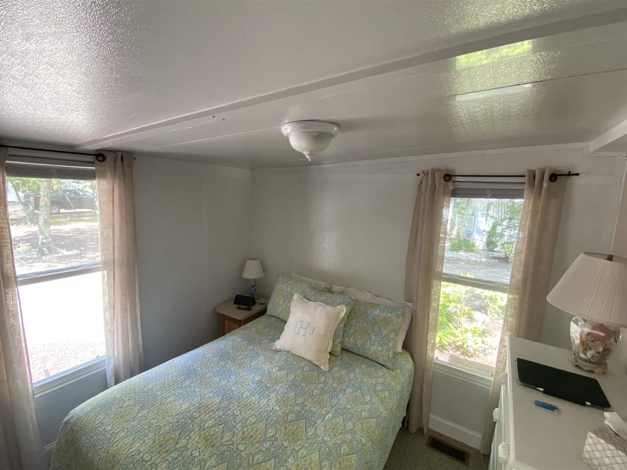 516 Highway 9 Marmora, NJ 08223 - Photo 13 of 28 a bedroom with a bed and a window