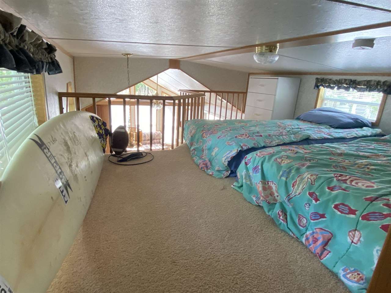 516 Highway 9 Marmora, NJ 08223 - Photo 6 of 28 a bed room with a bed and a large window