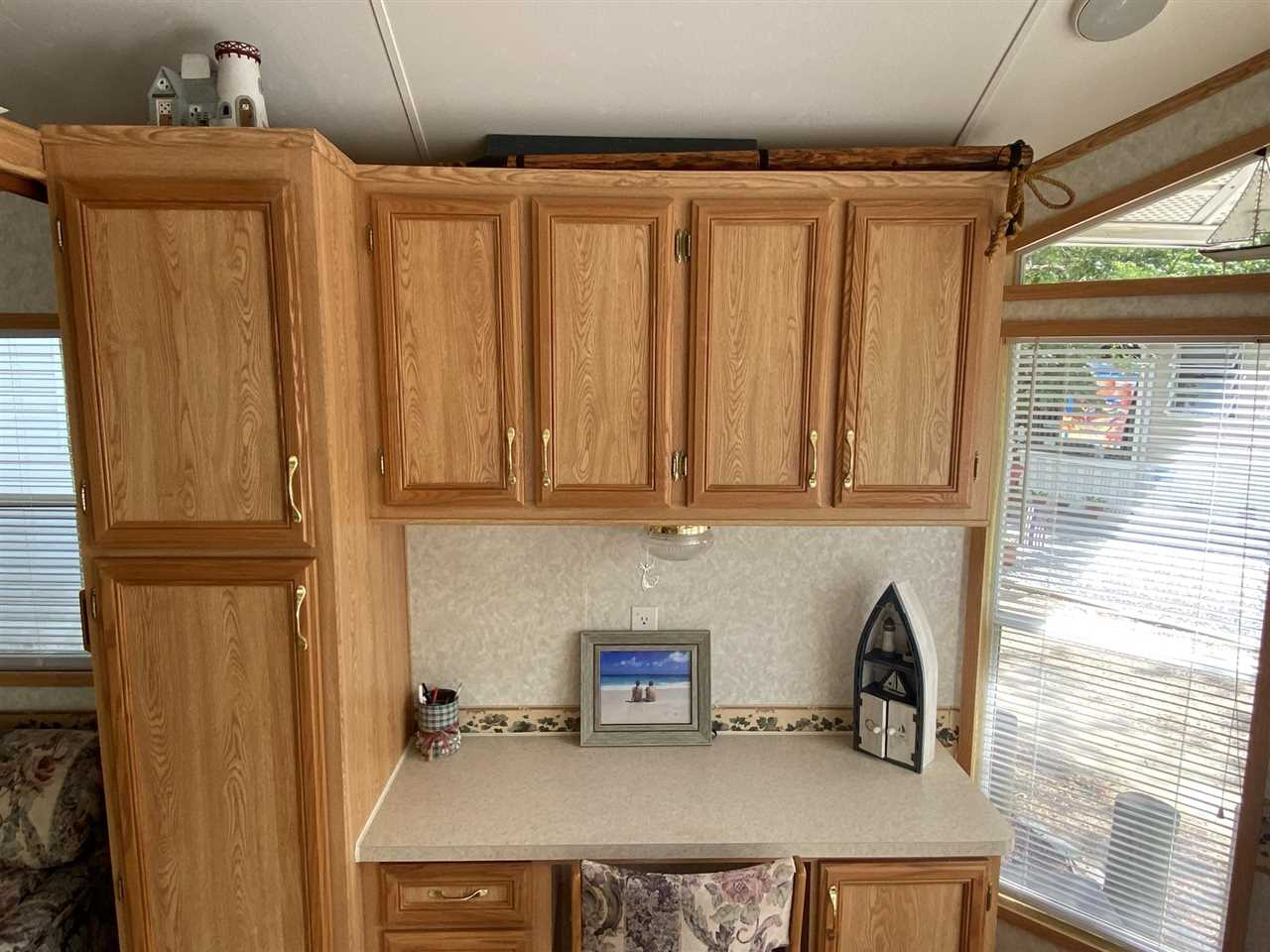 516 Highway 9 Marmora, NJ 08223 - Photo 8 of 28 a kitchen with stainless steel appliances granite countertop a refrigerator and a stove