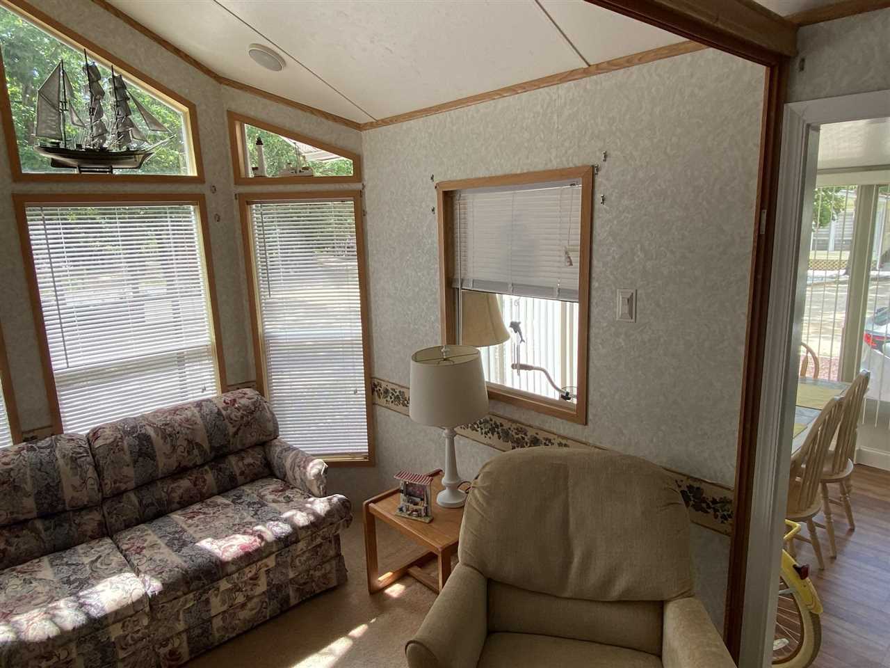 516 Highway 9 Marmora, NJ 08223 - Photo 9 of 28 a living room with furniture and a window