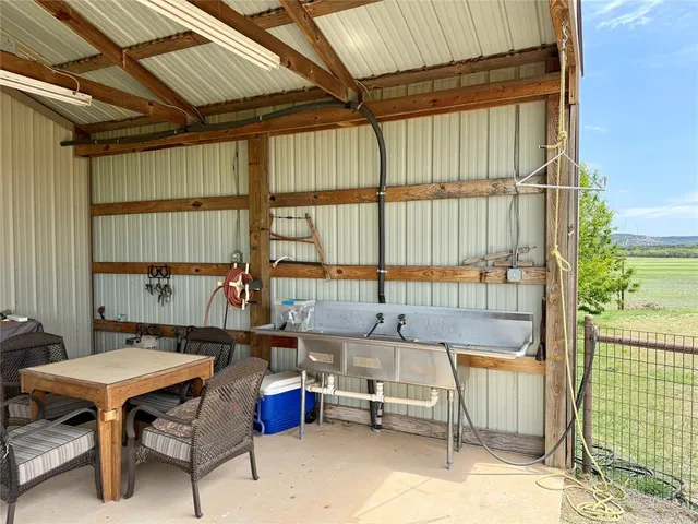 a view of a lake with houses in the back