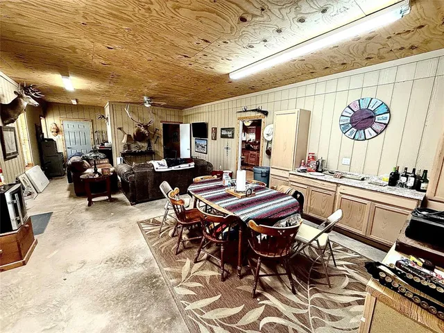 a view of a living room and dining room