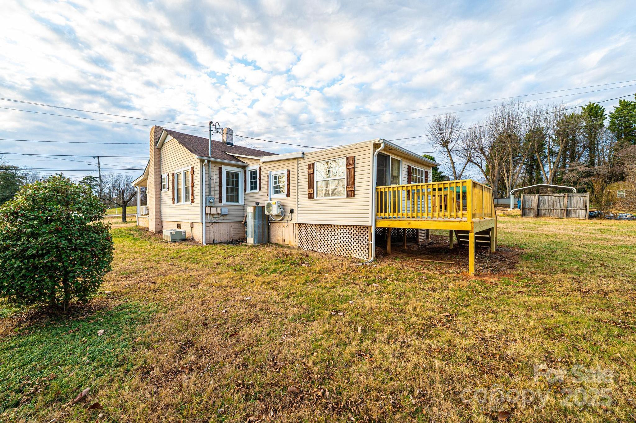 80 Duke Street Granite Falls, NC 28630 - Photo 19 of 48 a house view with a garden space