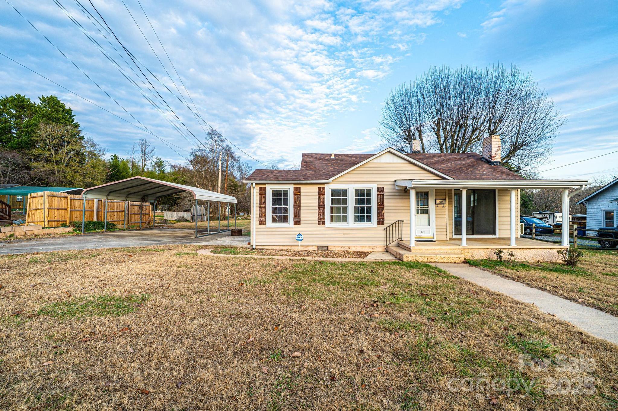 80 Duke Street Granite Falls, NC 28630 - Photo 3 of 48 a front view of a house with a yard