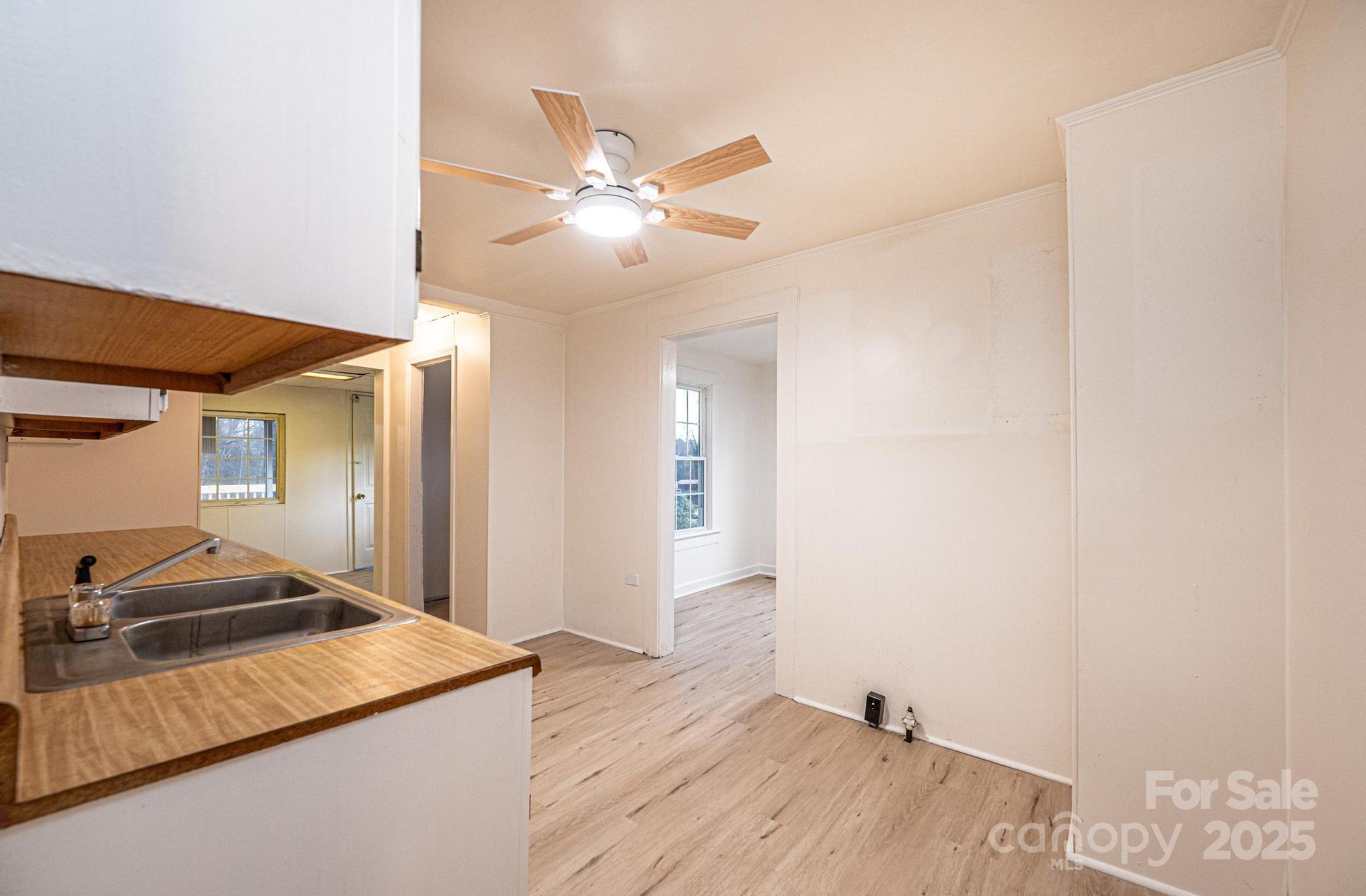 80 Duke Street Granite Falls, NC 28630 - Photo 32 of 48 a view of a kitchen with a sink and dishwasher