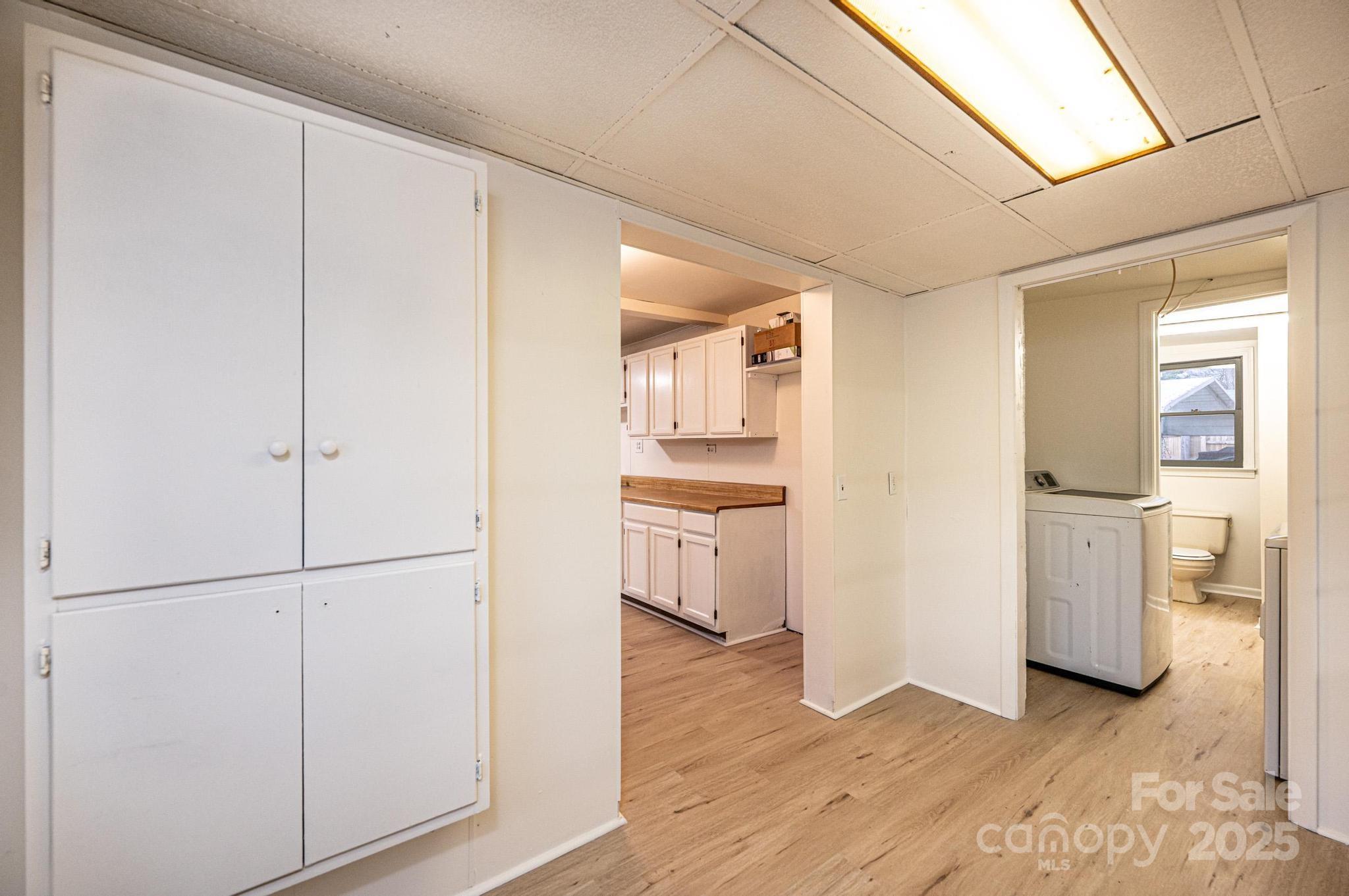 80 Duke Street Granite Falls, NC 28630 - Photo 37 of 48 a view of a kitchen with a refrigerator and a stove