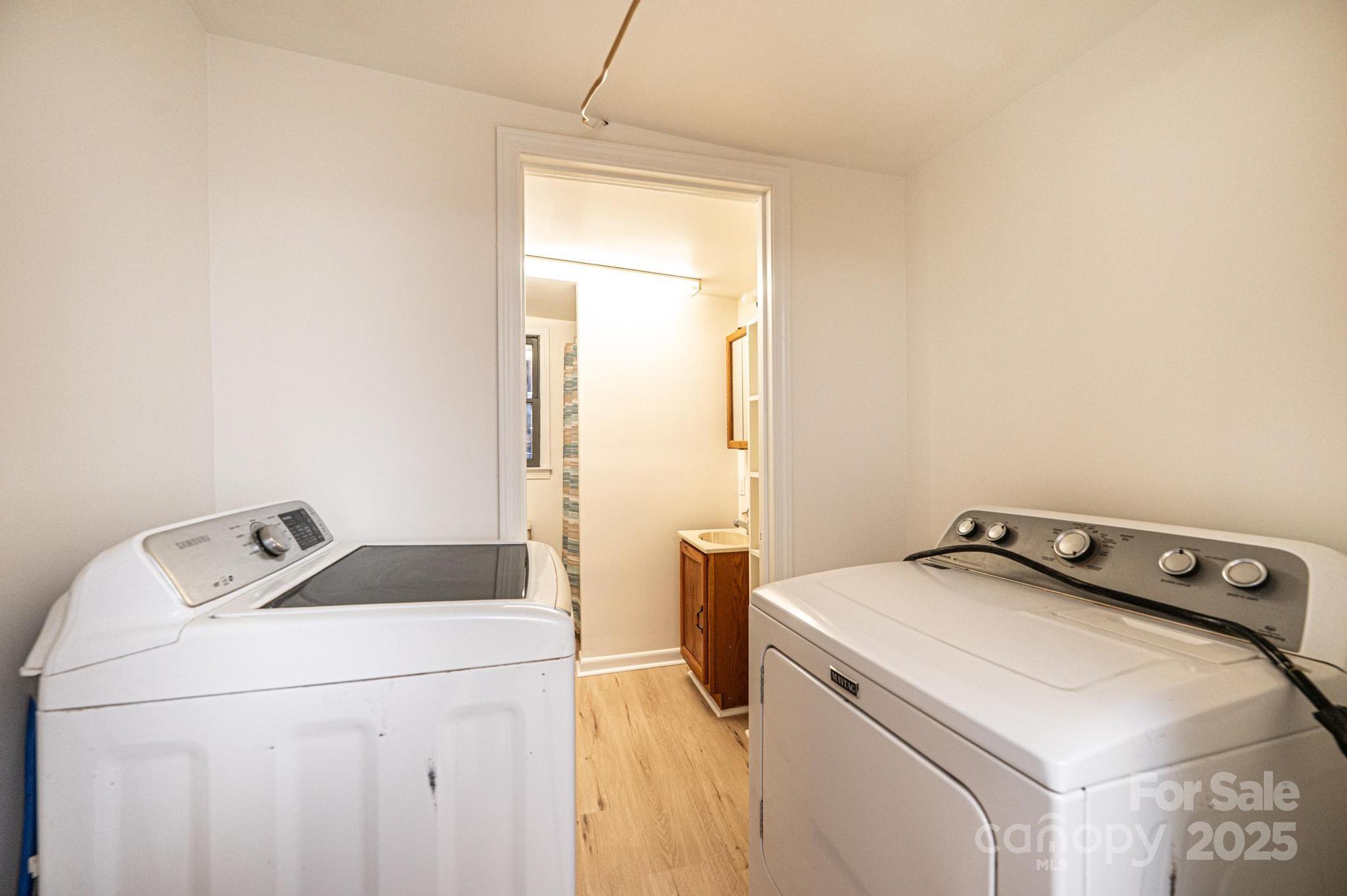 80 Duke Street Granite Falls, NC 28630 - Photo 39 of 48 a utility room with dryer and washer