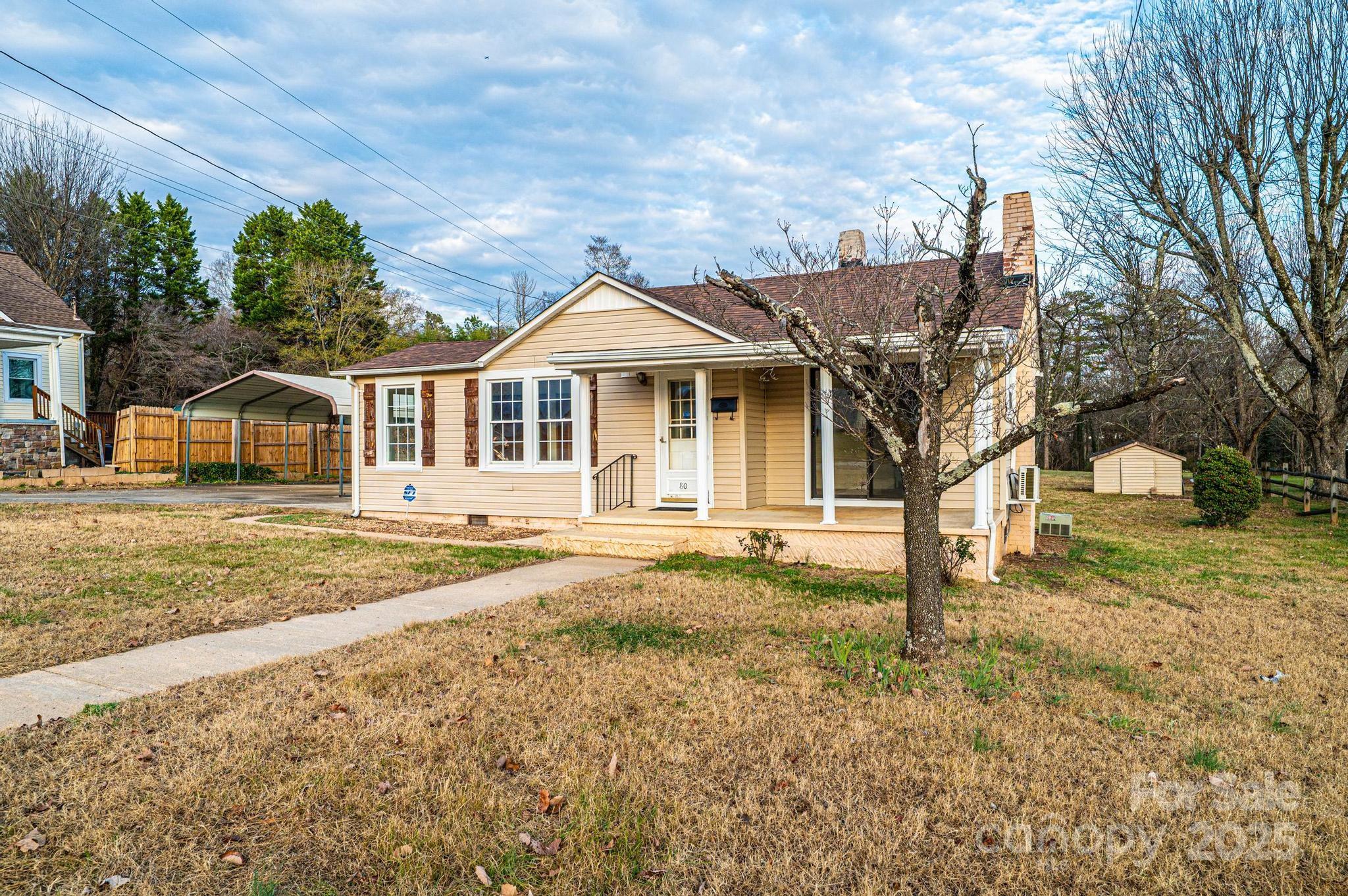80 Duke Street Granite Falls, NC 28630 - Photo 6 of 48 a front view of a house with a yard