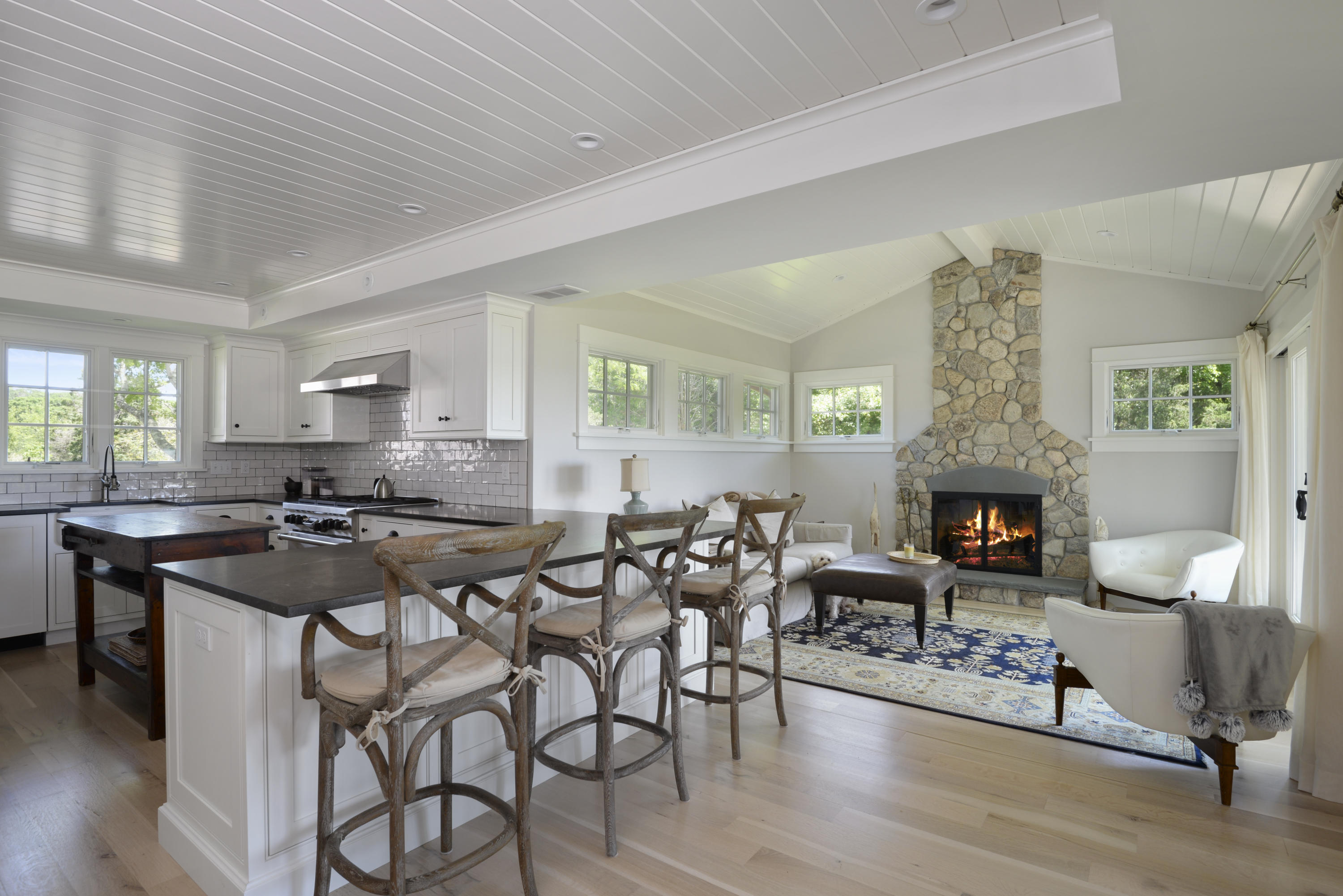 84 Old Dock Road Falmouth, MA 02540 - Photo 12 of 36 a open kitchen with a table and chairs