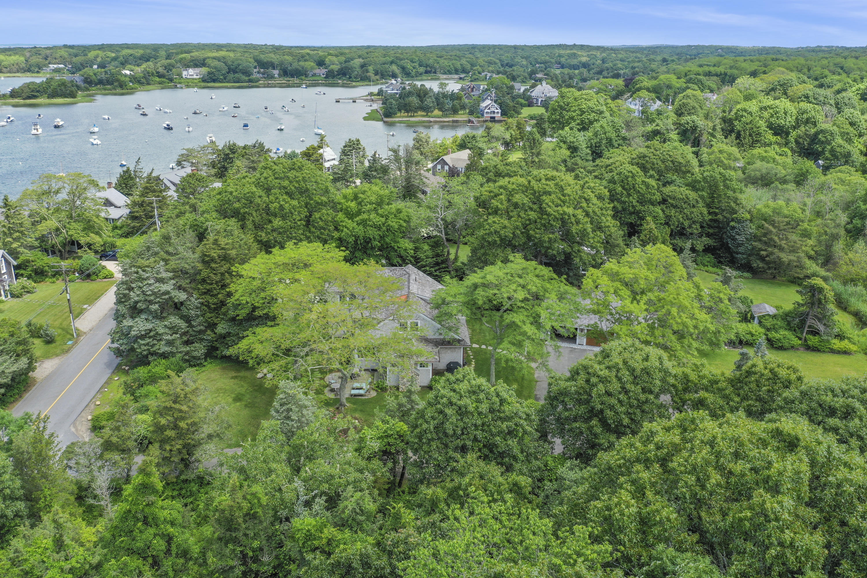 84 Old Dock Road Falmouth, MA 02540 - Photo 3 of 36 an aerial view of a houses with a yard