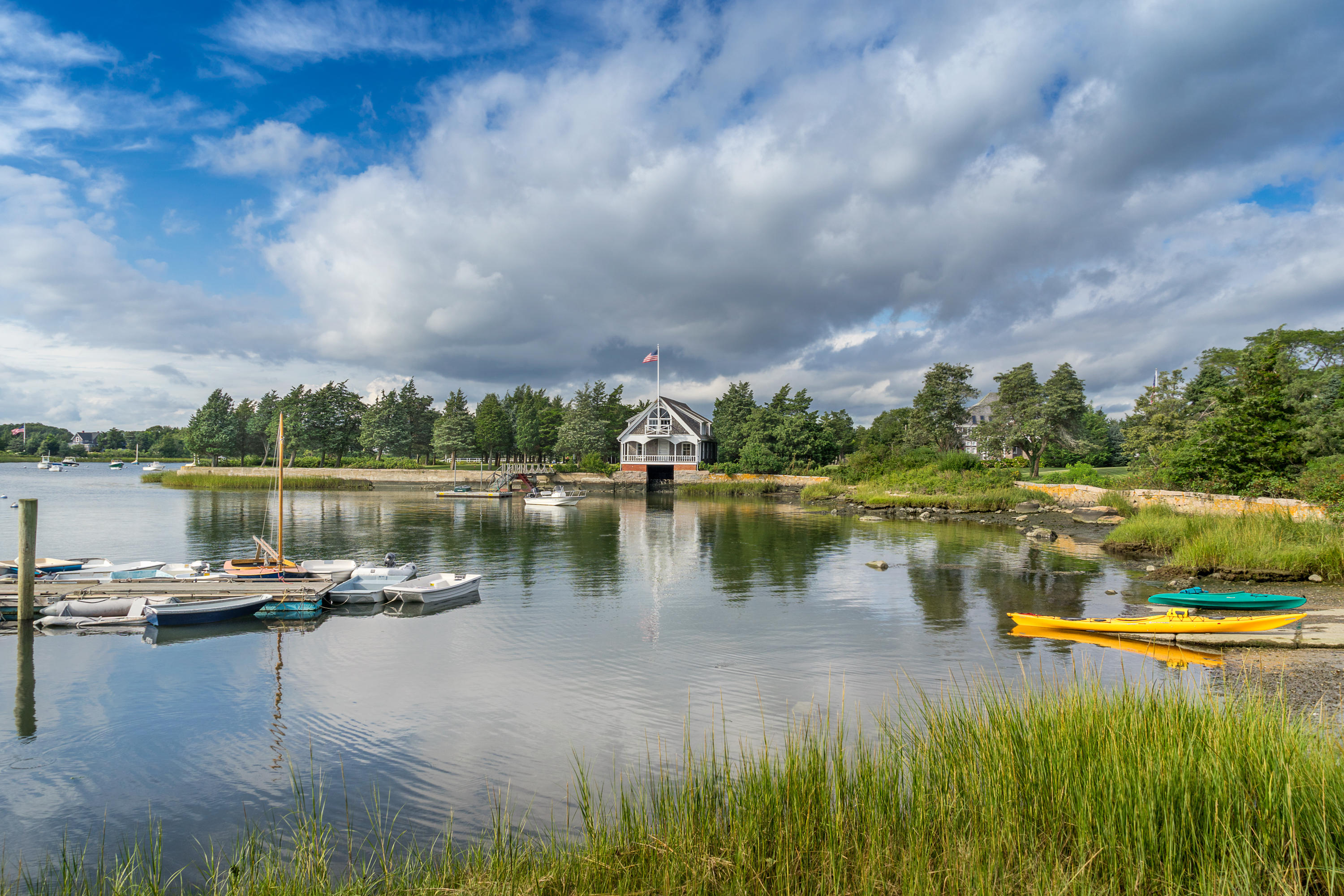 84 Old Dock Road Falmouth, MA 02540 - Photo 32 of 36 a view of a lake with houses in the back