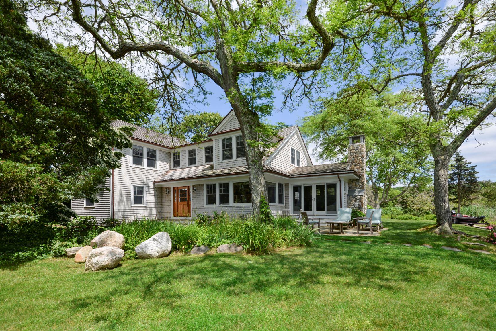84 Old Dock Road Falmouth, MA 02540 - Photo 4 of 36 a front view of a house with garden