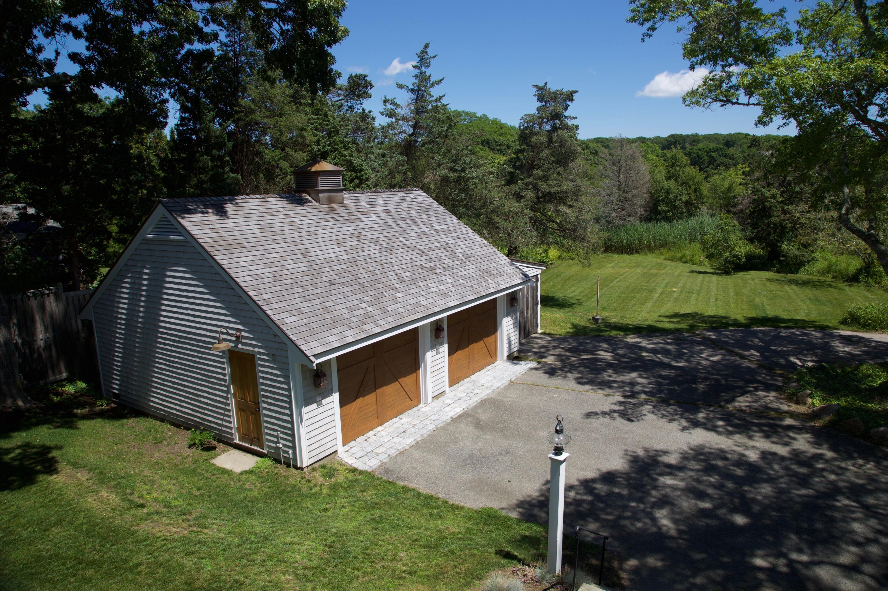 84 Old Dock Road Falmouth, MA 02540 - Photo 7 of 36 a backyard of a house with lots of green space