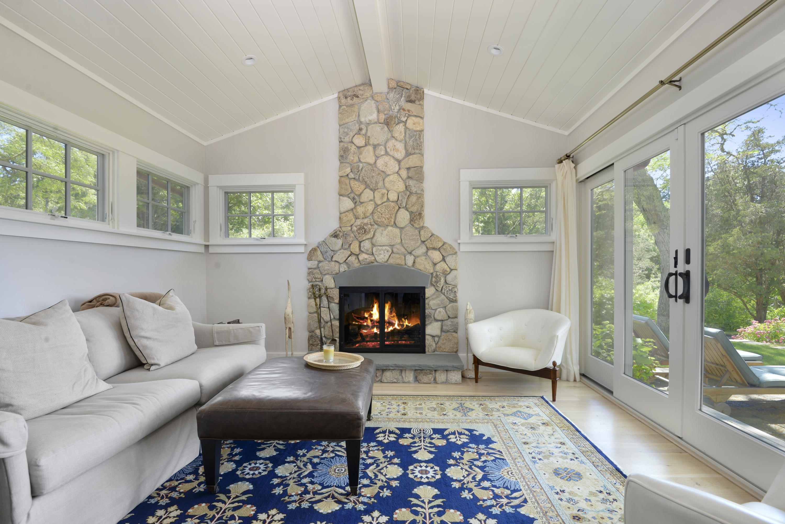 84 Old Dock Road Falmouth, MA 02540 - Photo 10 of 36 a living room with furniture a window and a fireplace