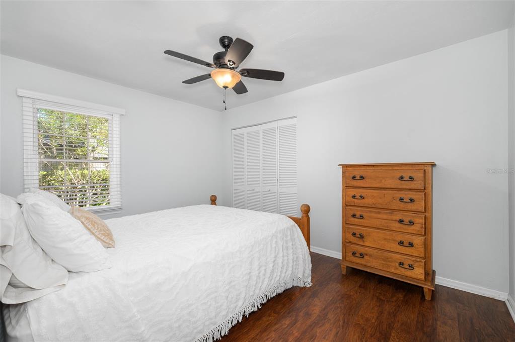 5326 Southwest 83 Terrace Gainesville, FL 32608 - Photo 27 of 40 a bedroom with a bed and a closet