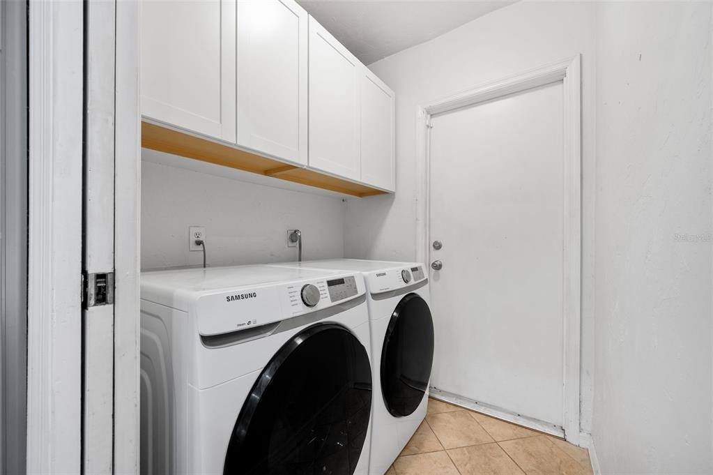 5326 Southwest 83 Terrace Gainesville, FL 32608 - Photo 32 of 40 a utility room with dryer and washer