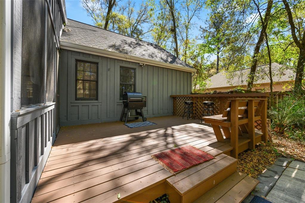5326 Southwest 83 Terrace Gainesville, FL 32608 - Photo 35 of 40 a view of a house with backyard and wooden fence