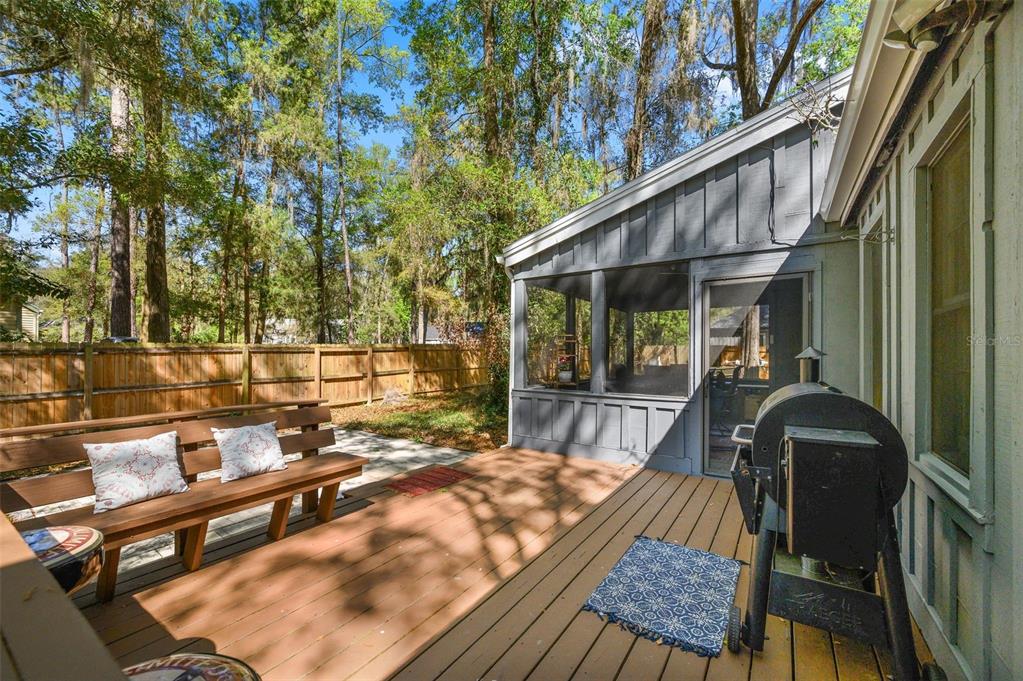 5326 Southwest 83 Terrace Gainesville, FL 32608 - Photo 36 of 40 a view of backyard with outdoor seating and barbeque oven