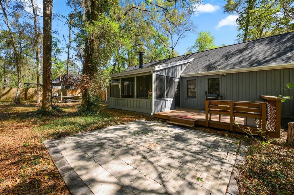 5326 Southwest 83 Terrace Gainesville, FL 32608 - Photo 40 of 40 a view of a house with a yard and sitting area
