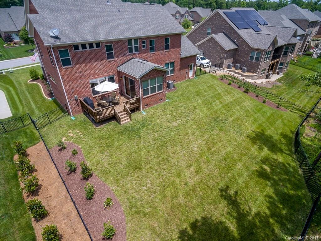 8037 Clems Branch Road, Unit 137 Indian Land, SC 29707 - Photo 24 of 24 an aerial view of a house with a garden