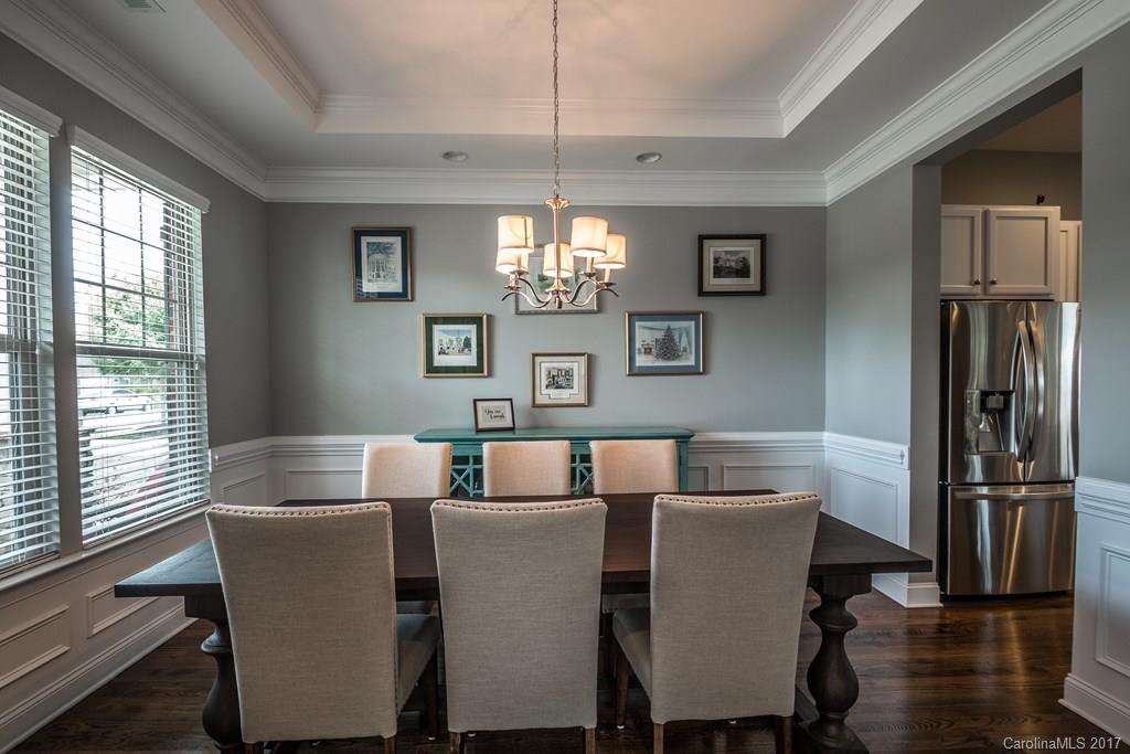 8037 Clems Branch Road, Unit 137 Indian Land, SC 29707 - Photo 8 of 24 a dining room with furniture and window