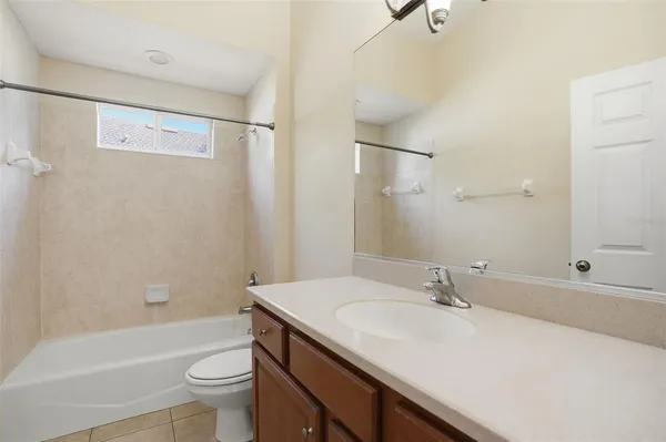 an empty room with closet area