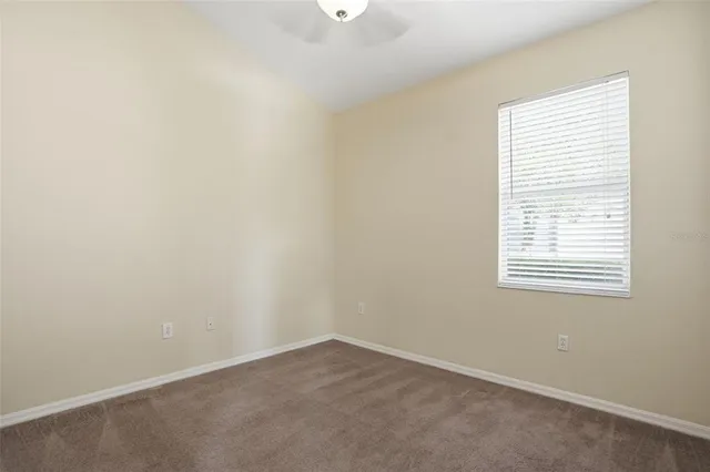 a bathroom with a sink and vanity
