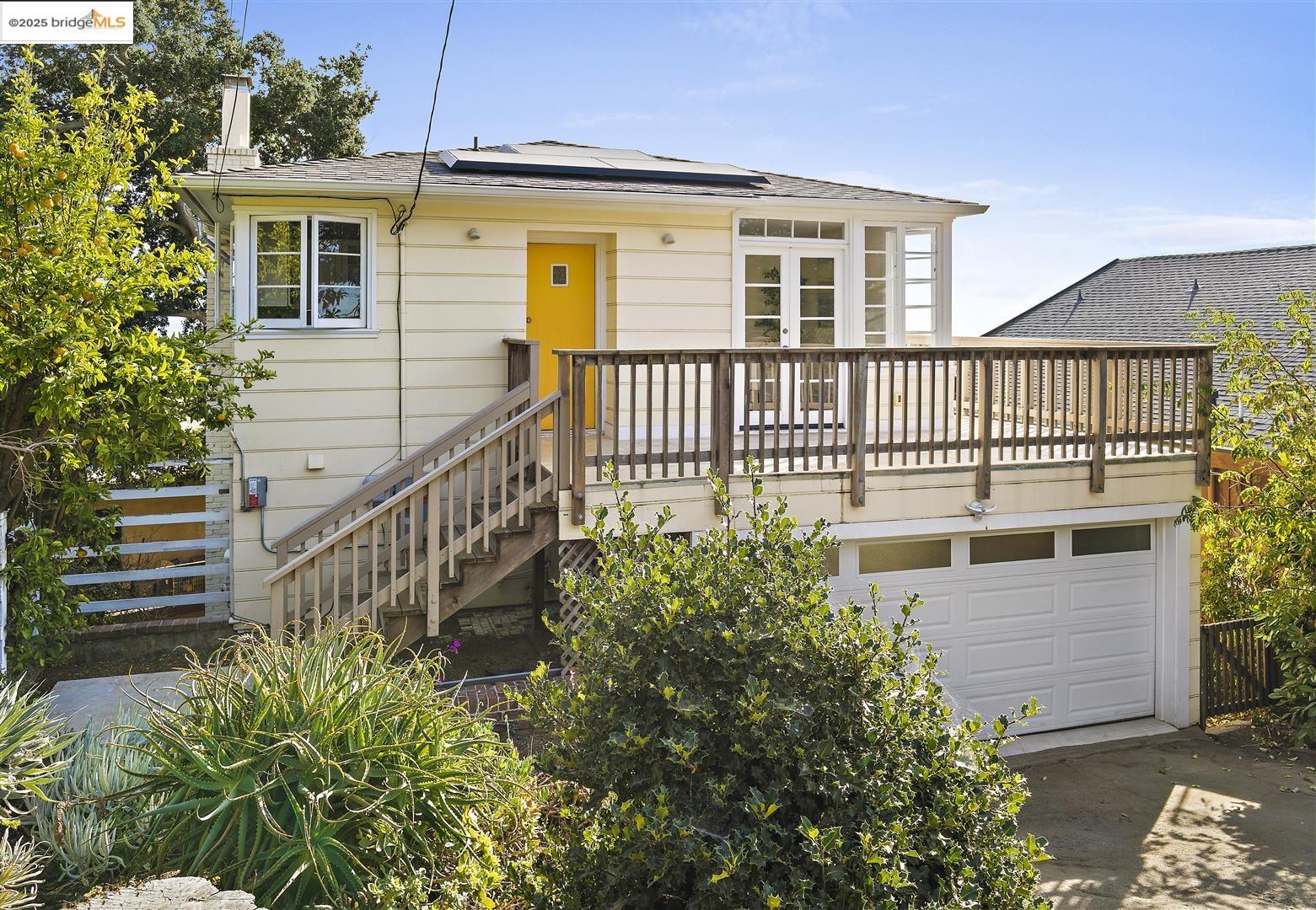 358 Panoramic Way Berkeley, CA 94704 - Photo 1 of 1 a front view of a house with a yard