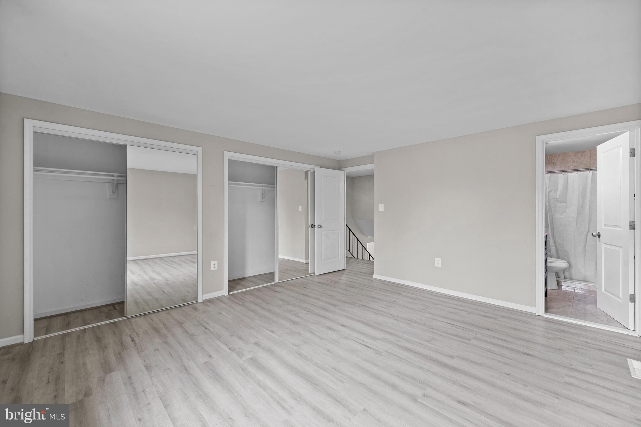 5908 Michael Road Waldorf, MD 20601 - Photo 21 of 44 an empty room with wooden floor & closet area