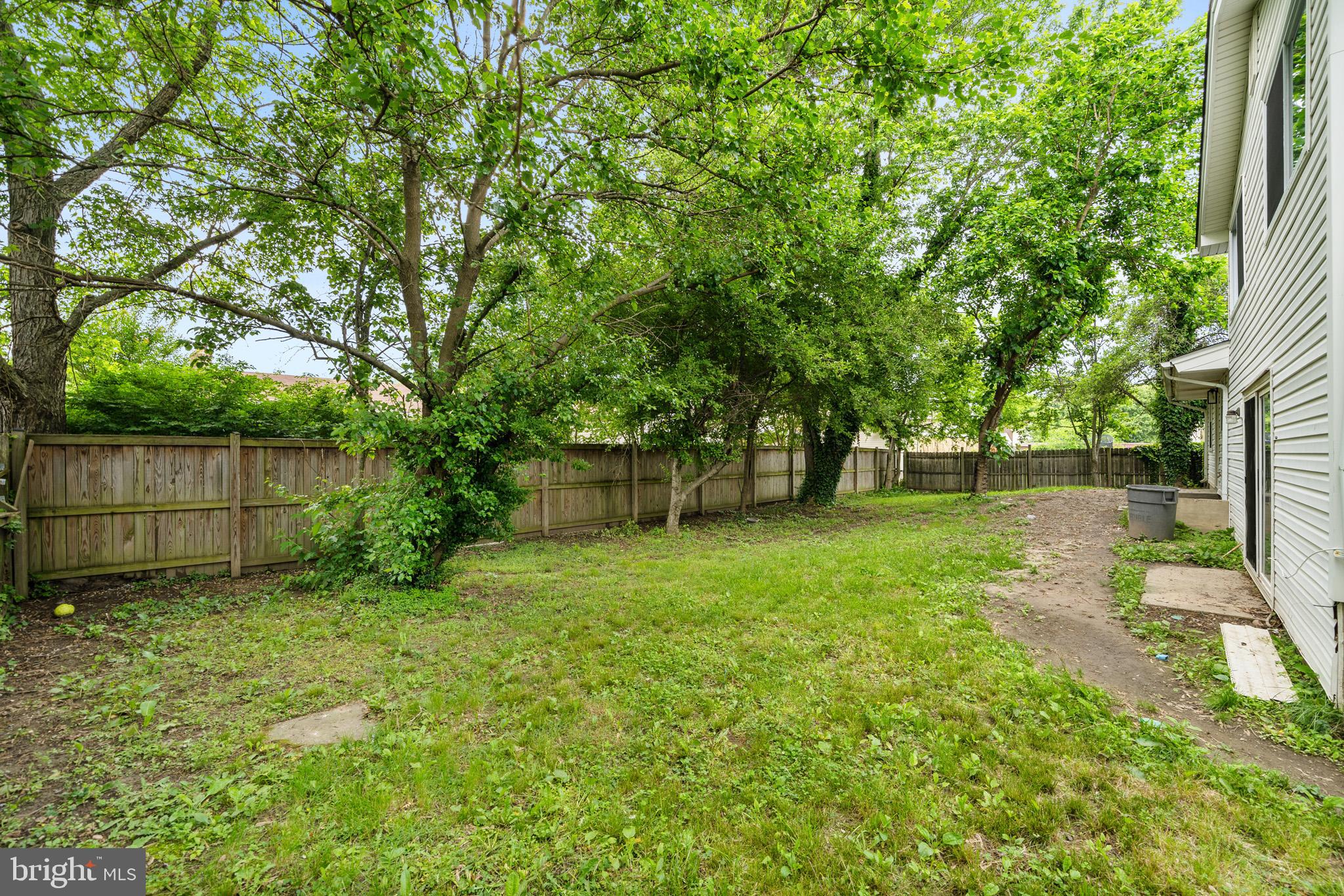5908 Michael Road Waldorf, MD 20601 - Photo 41 of 44 a view of a backyard with large trees