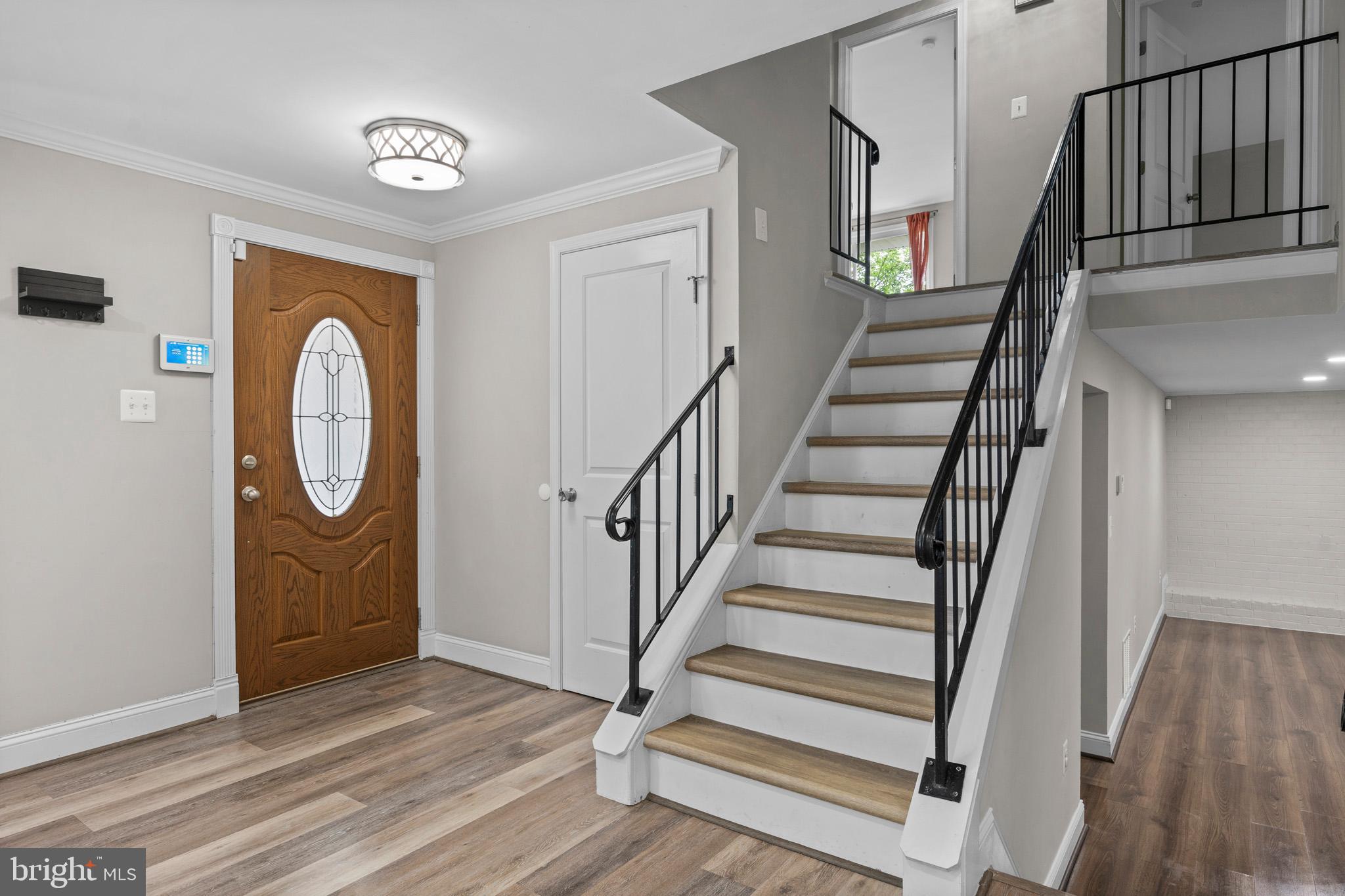 5908 Michael Road Waldorf, MD 20601 - Photo 6 of 44 a view of entryway with wooden floor and window