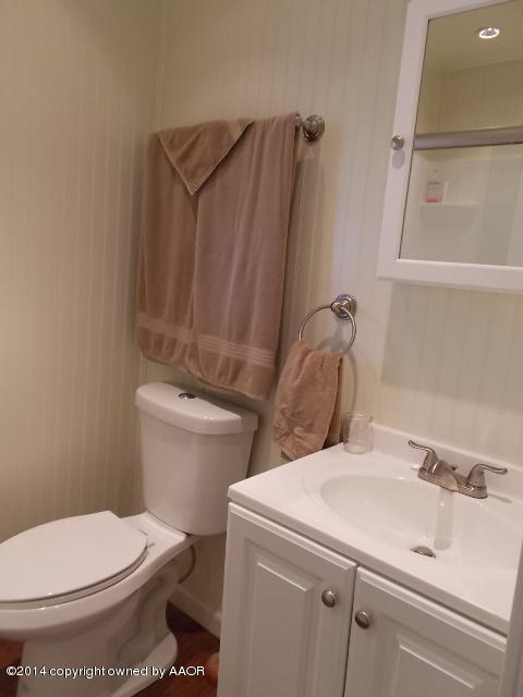 501 2nd Street Groom, TX 79039 - Photo 15 of 19 a bathroom with a sink and toilet
