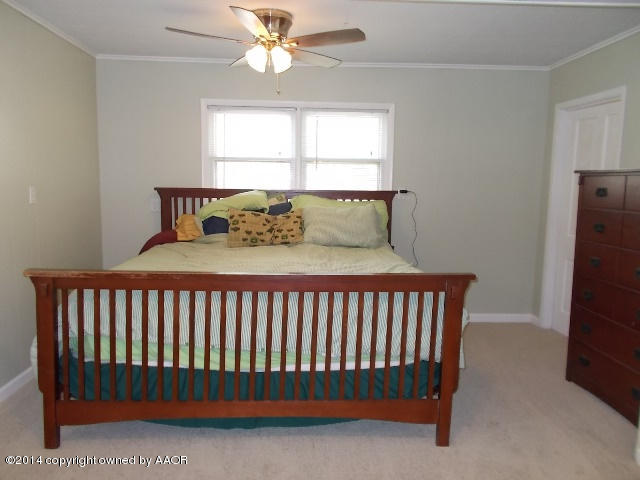 501 2nd Street Groom, TX 79039 - Photo 17 of 19 a bedroom with a bed and a window
