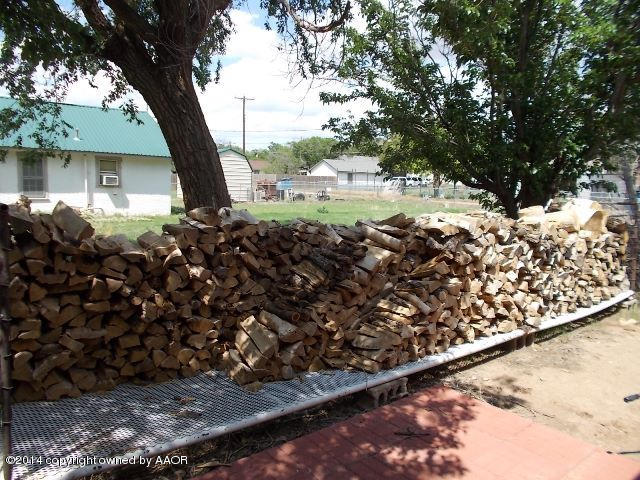 501 2nd Street Groom, TX 79039 - Photo 19 of 19 a view of a yard with wooden fence