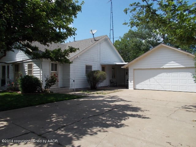 501 2nd Street Groom, TX 79039 - Photo 4 of 19 a view of a house with a yard and garage