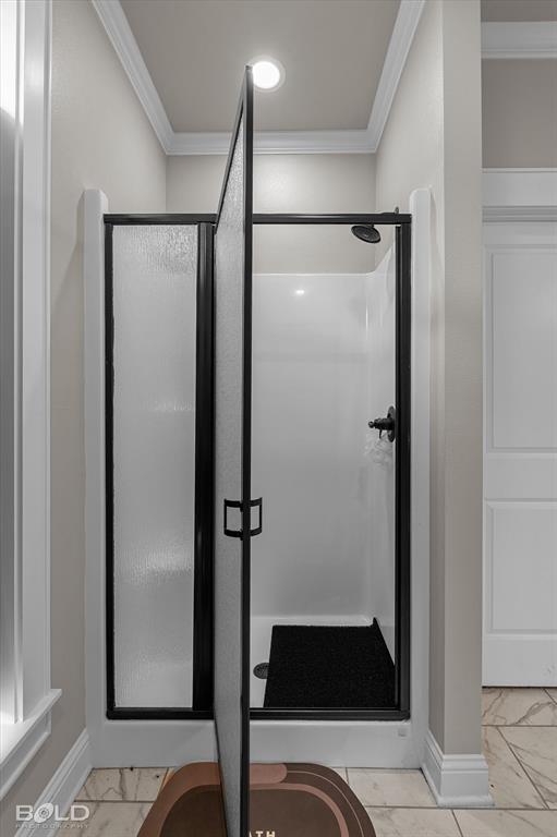 6896 Bethany Reed Circle Blanchard, LA 71107 - Photo 32 of 37 Enclosed shower stall featuring a black-framed frosted glass door, matte black shower fixtures, a white shower base, and recessed ceiling lighting
